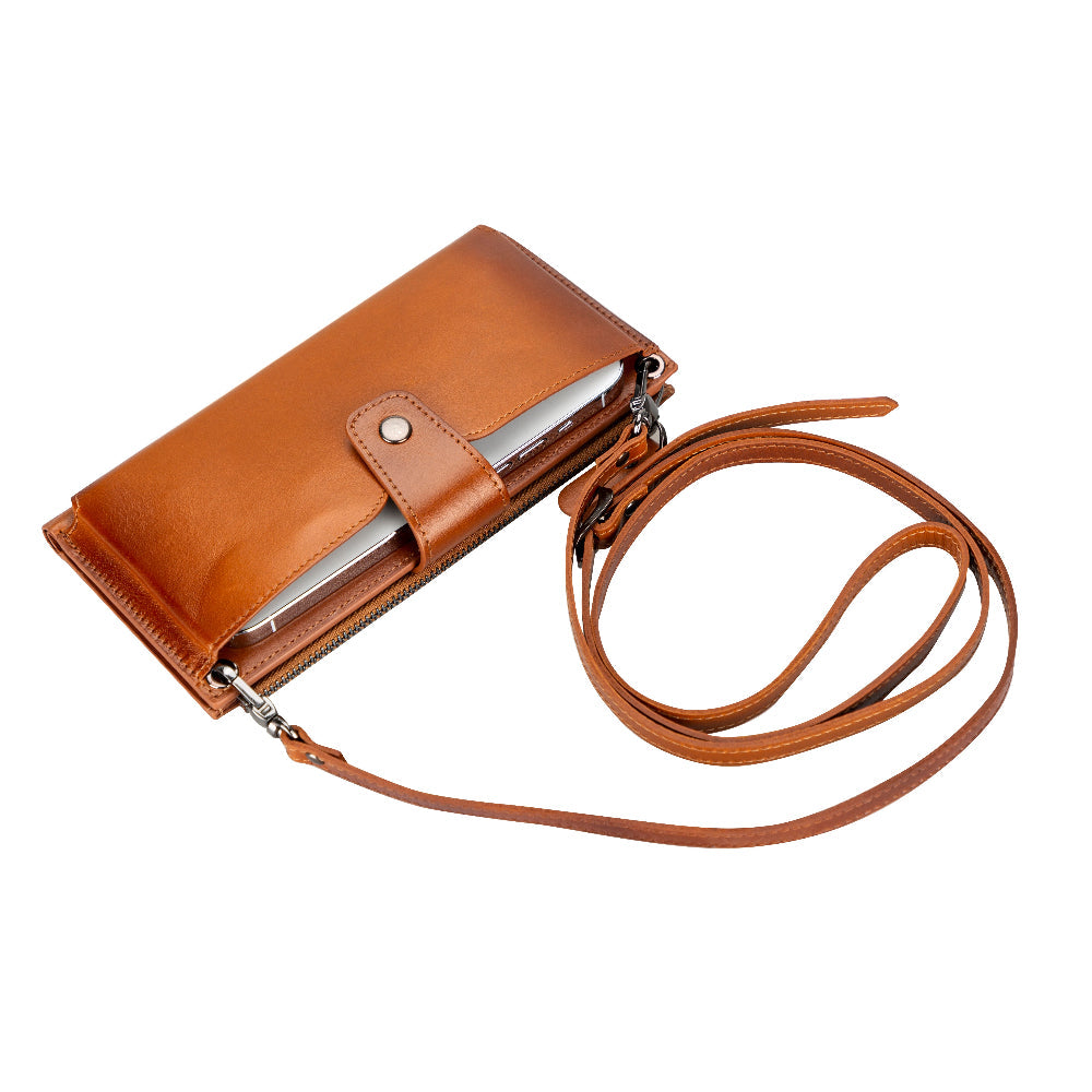 Brown leather wallet with a strap on a white background