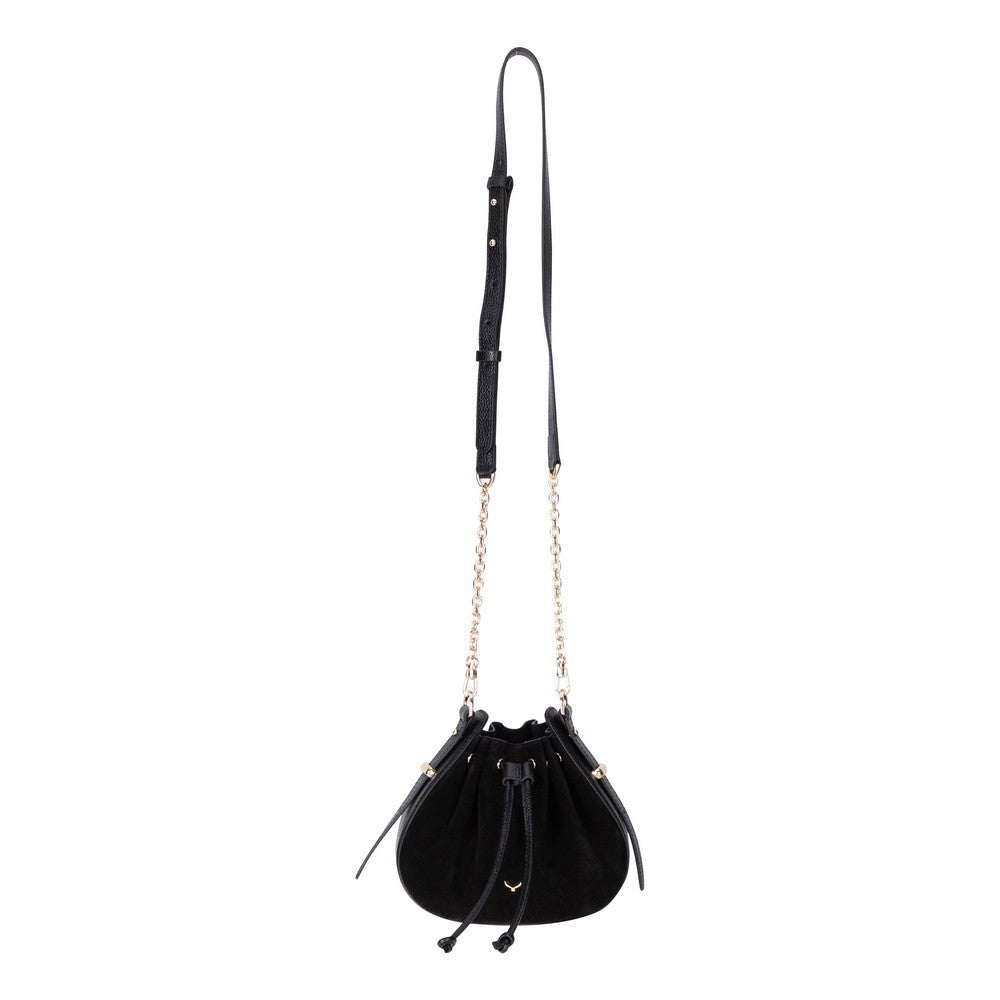 Black suede handbag with a chain detail on a white background