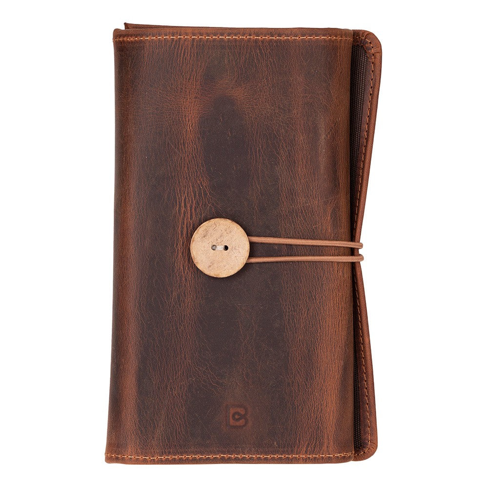 Brown leather notebook with a button closure on a white background