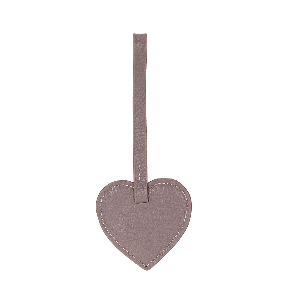 Heart-shaped gray tag with a strap on a white background