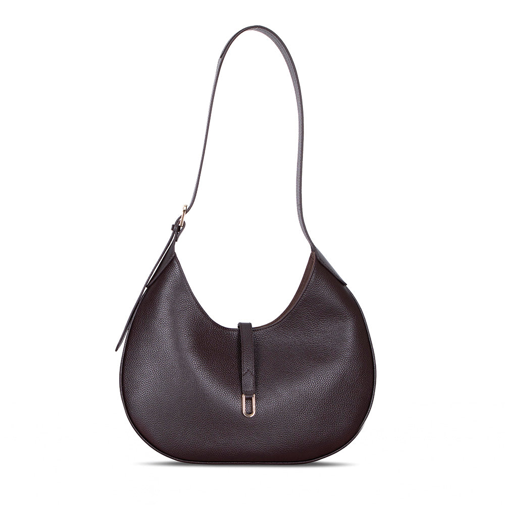 Brown leather handbag with a shoulder strap on a white background