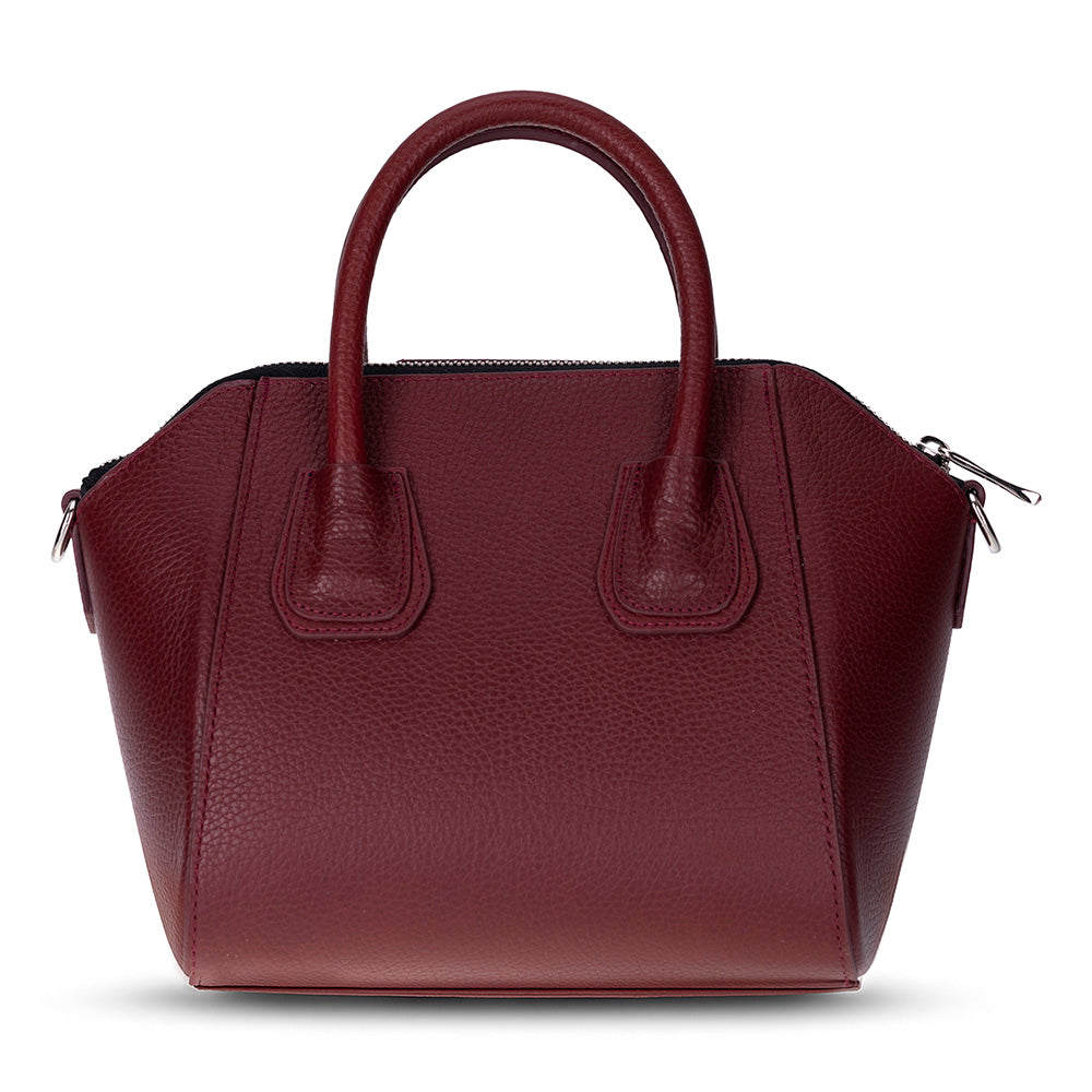 Maroon handbag on a white background