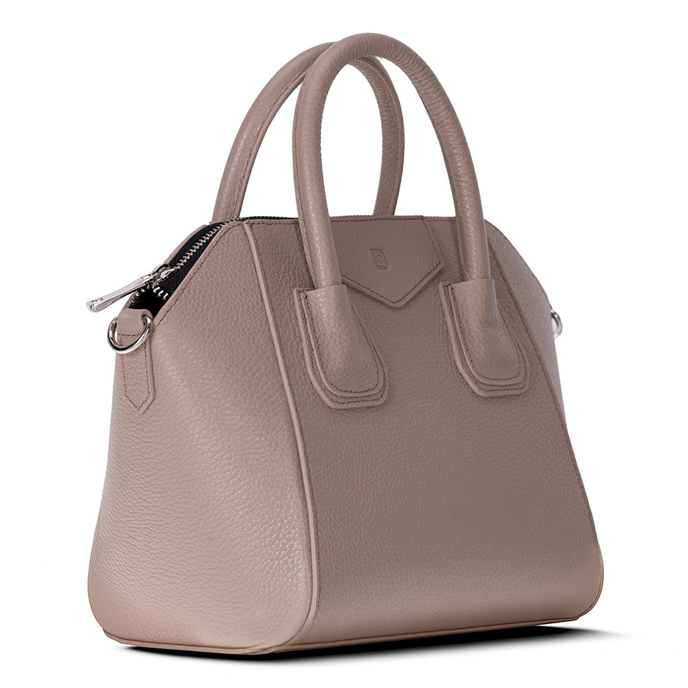 Beige handbag with a visible brand logo on a white background