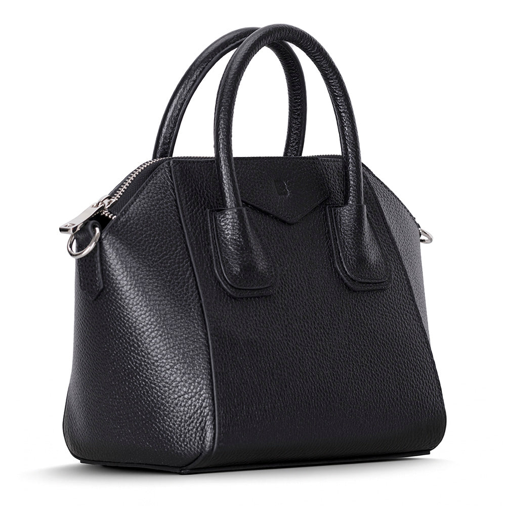 Black handbag on a white background