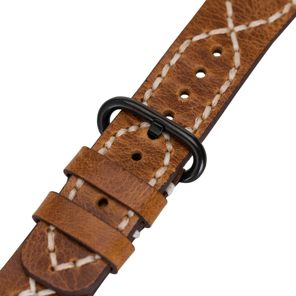 Brown leather watch strap with black buckle on a white background
