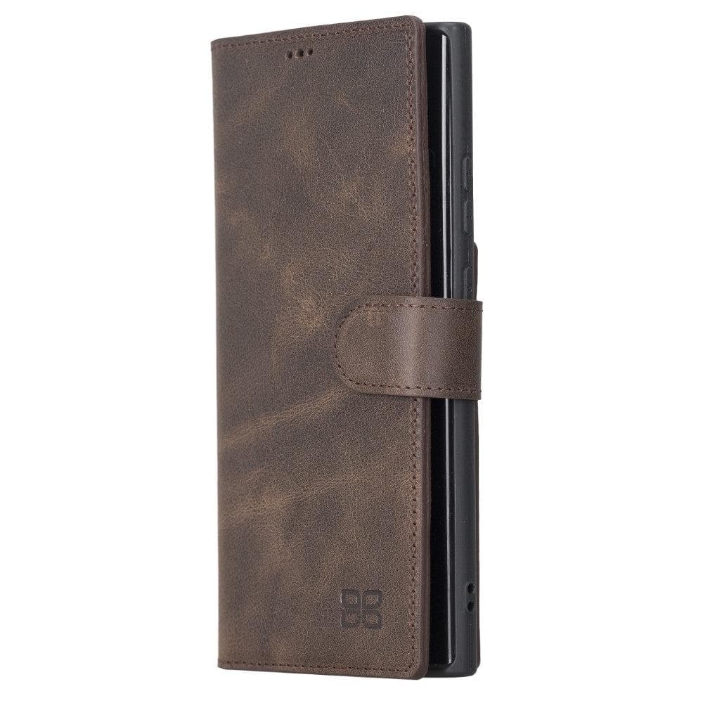 A brown, genuine leather mobile phone case with a non-detachable design, featuring a magnetic clip, card slots, and a phone case section.