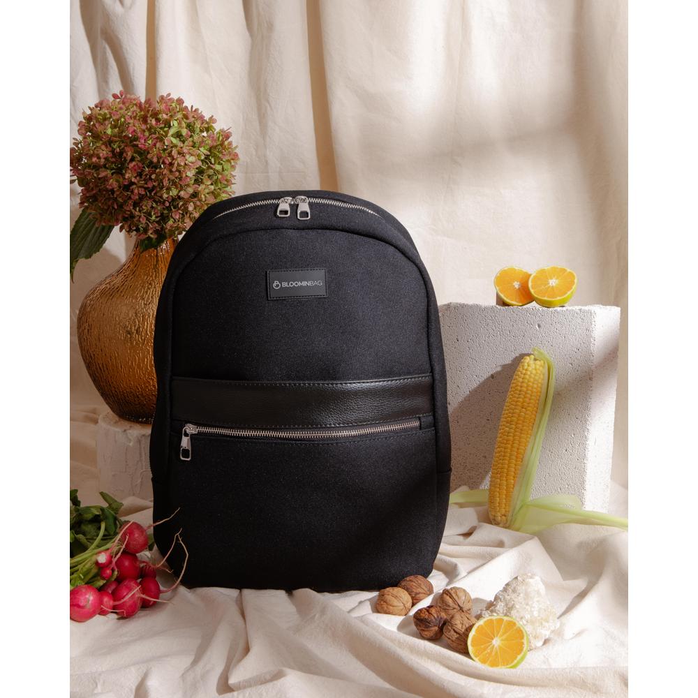Sustainable vegan leather MacBook backpack with water-resistant lining