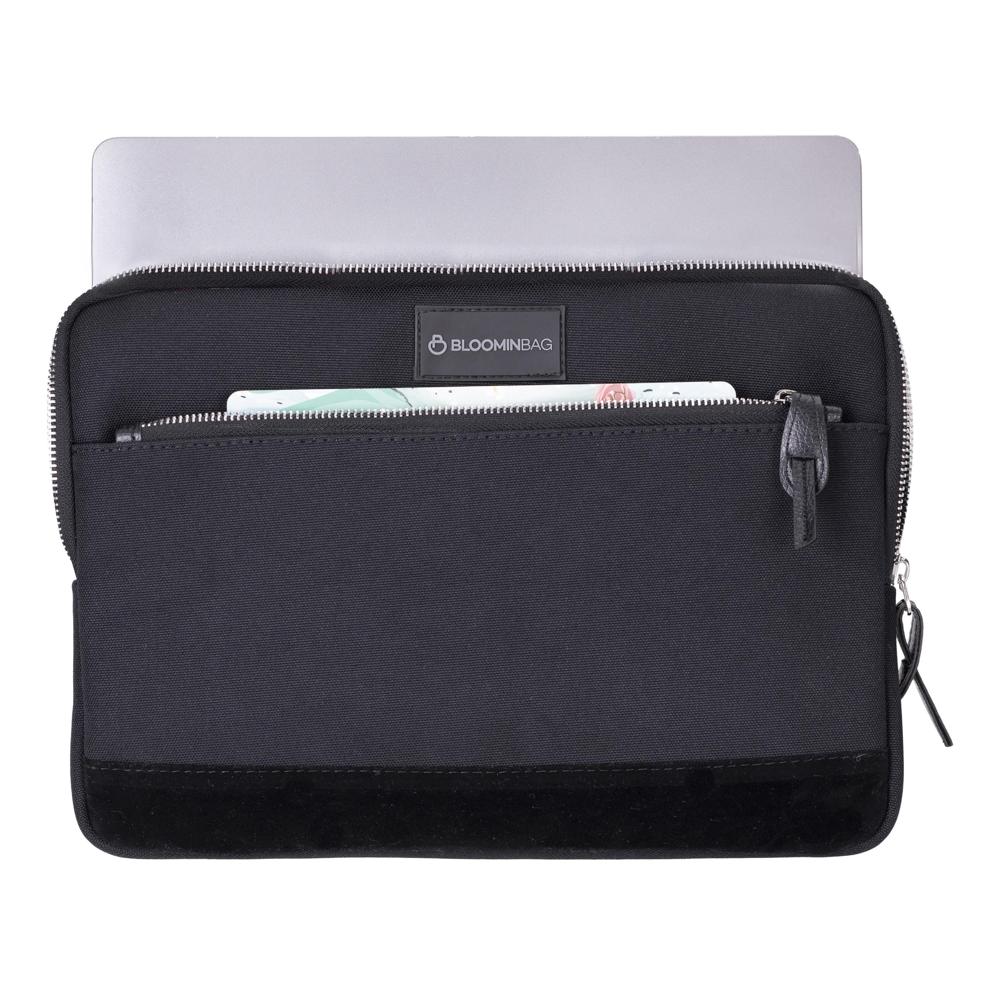 Eco-friendly laptop sleeve with water-repellent lining and vegan suede detail