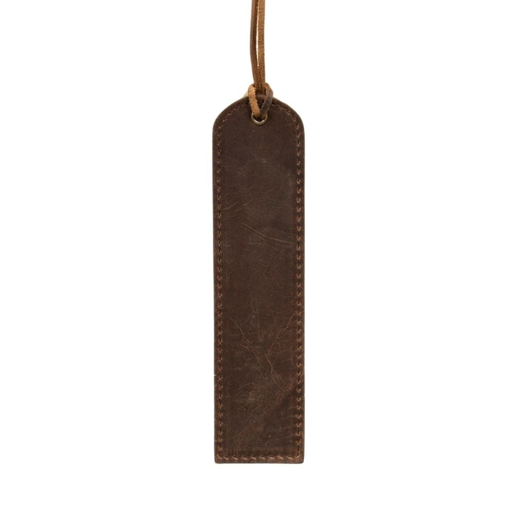 Brown leather tag with stitching on a white background