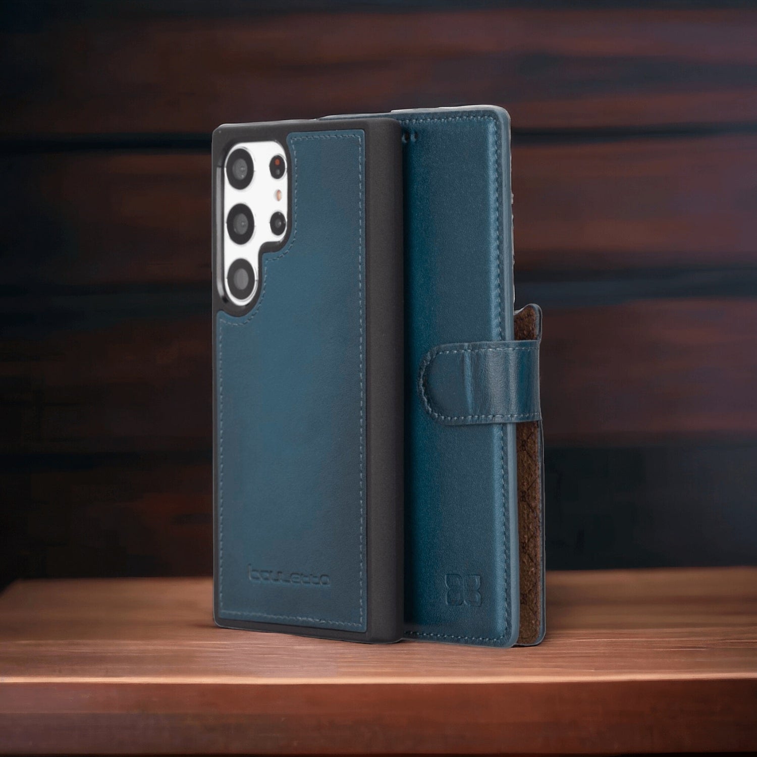 Blue Samsung Galaxy leather wallet case standing on wooden surface