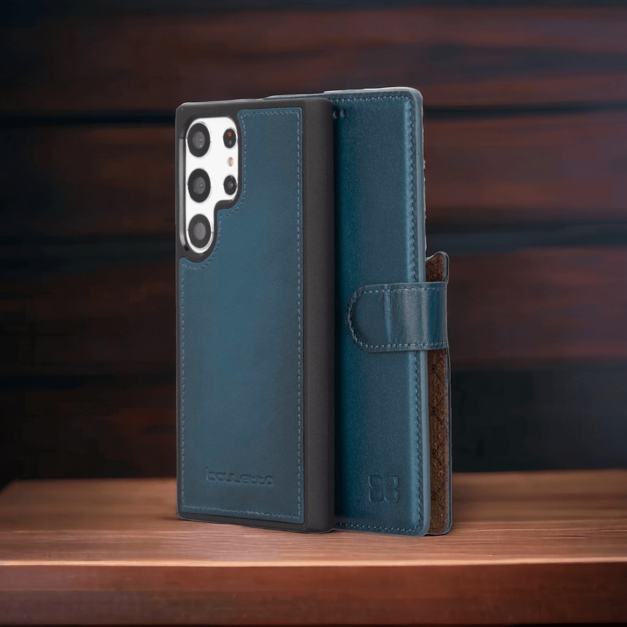 Blue Samsung Galaxy leather wallet case standing on wooden surface