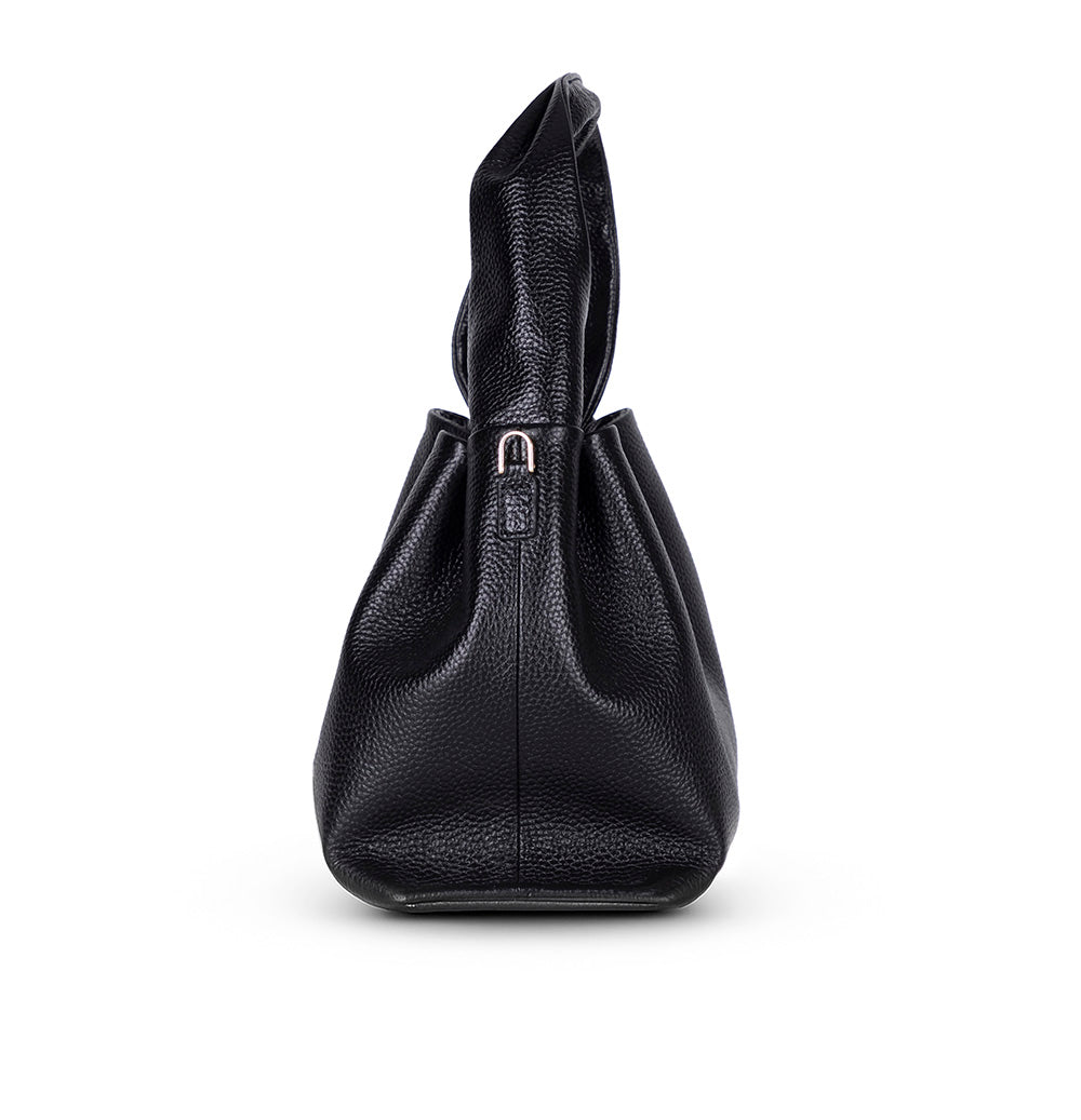 Black leather handbag on a white background