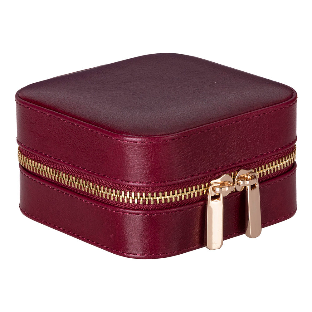 Maroon jewelry box with gold zipper on a white background