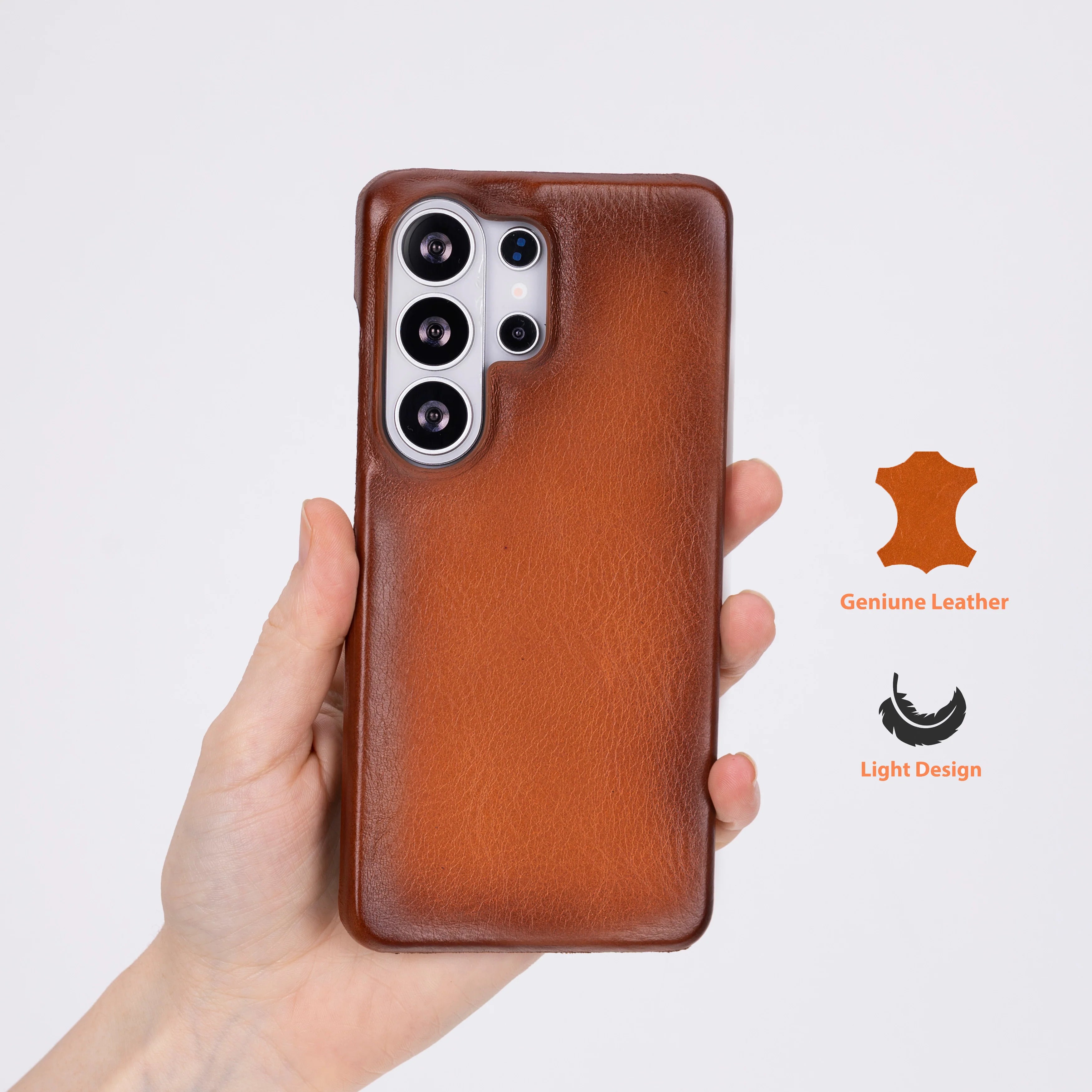 Brown leather phone case held by a hand on a white background