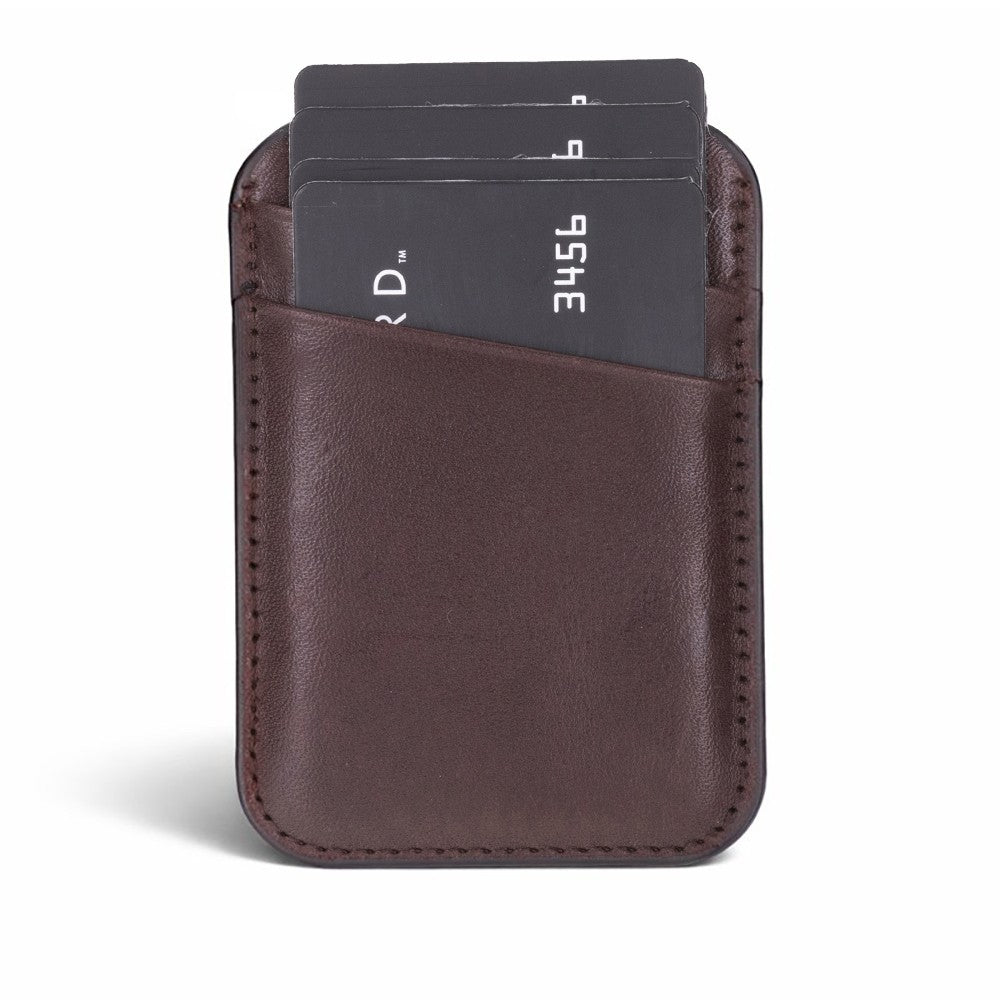 Brown leather cardholder with three cards on a white background