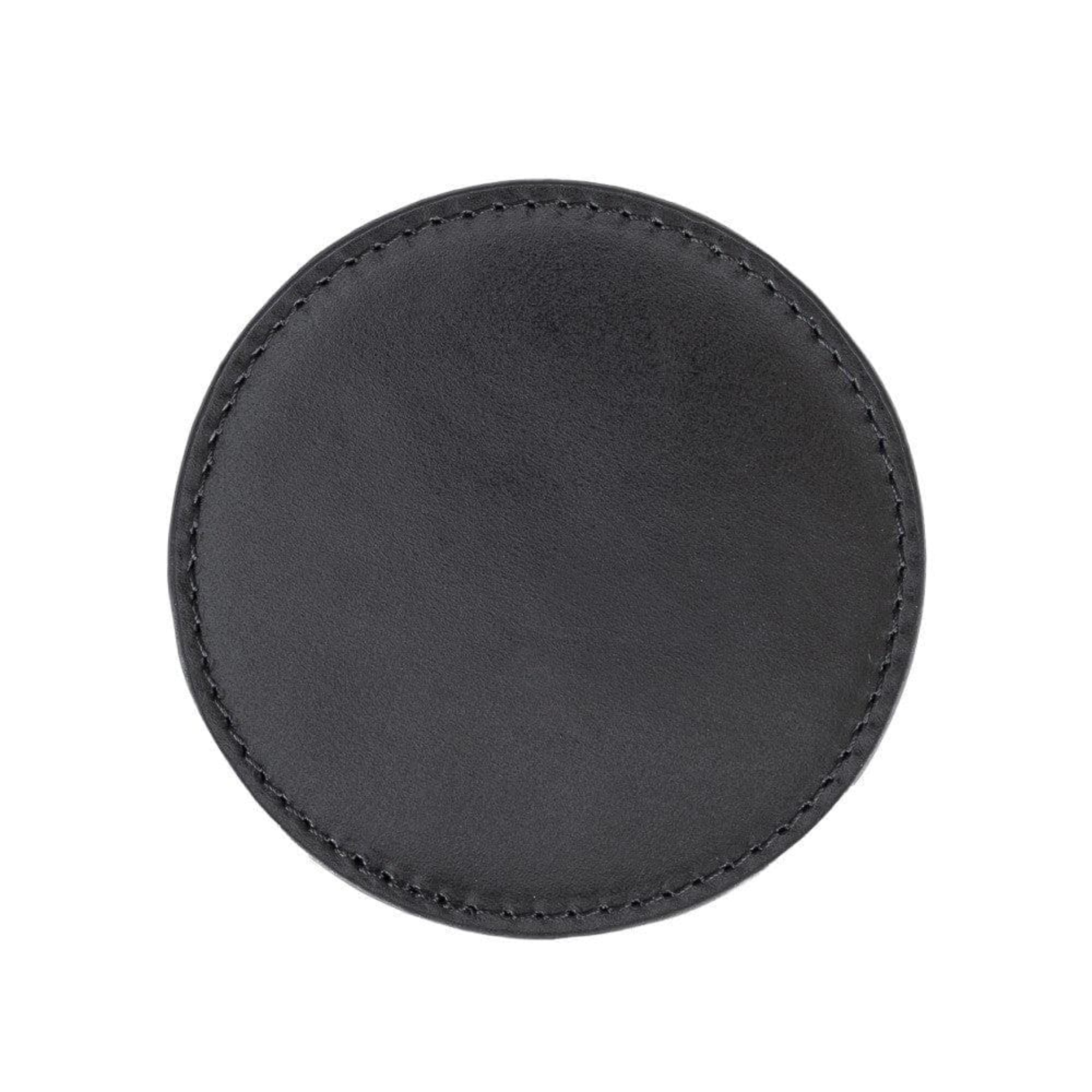 A round black leather coaster with visible stitching around the edge, shown on a plain white background.